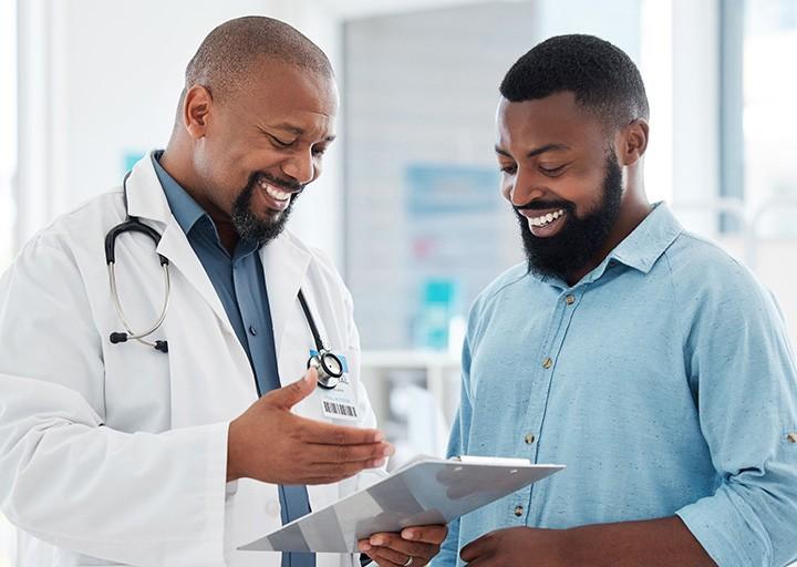 Doctor reviewing information with a patient