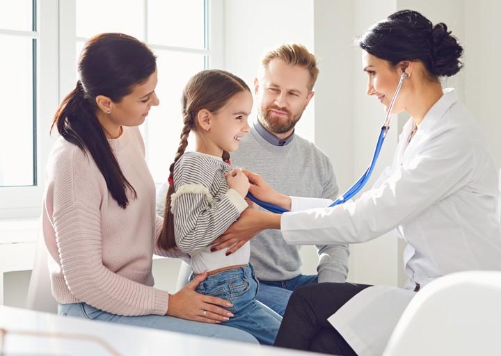 A doctor talking with patients